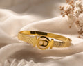 Golden Interlocking Medallion Bangle