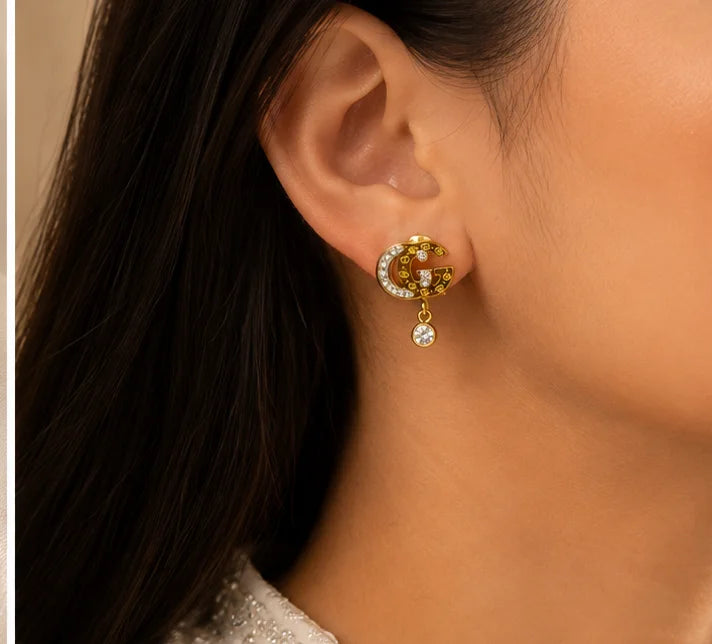 Gilded Crystal Emblem Drop Earrings