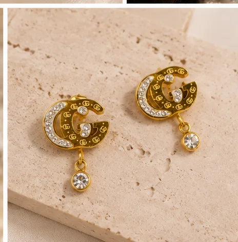Gilded Crystal Emblem Drop Earrings