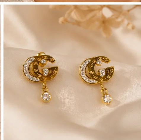 Gilded Crystal Emblem Drop Earrings