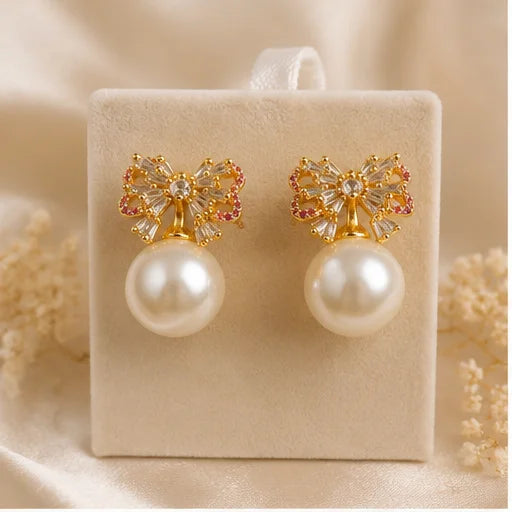 Gilded Bow Pearl Drop Earrings