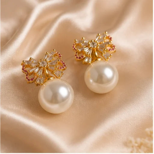 Gilded Bow Pearl Drop Earrings