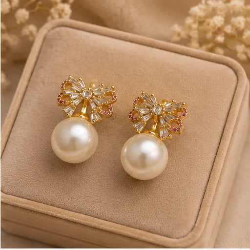 Gilded Bow Pearl Drop Earrings