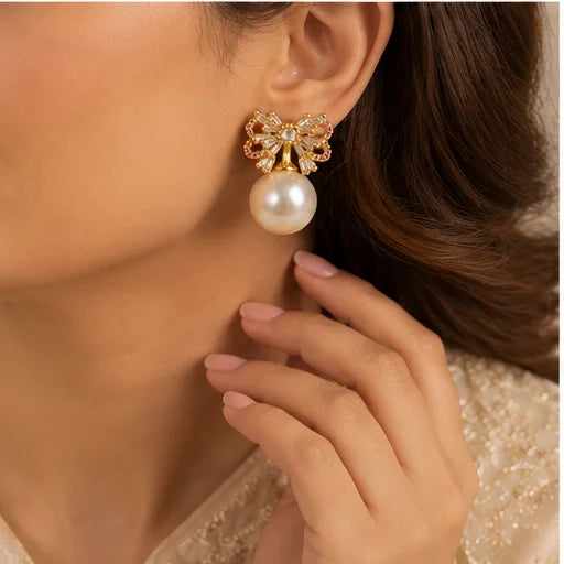 Gilded Bow Pearl Drop Earrings