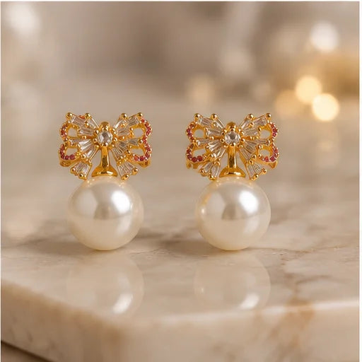 Gilded Bow Pearl Drop Earrings