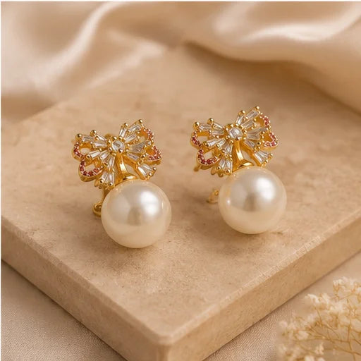 Gilded Bow Pearl Drop Earrings